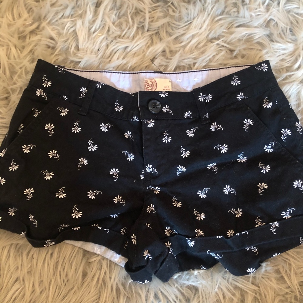 black shorts with white flowers